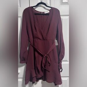 NWT MOD ON TREND Long Sleeved Plum Dress with tie belt.